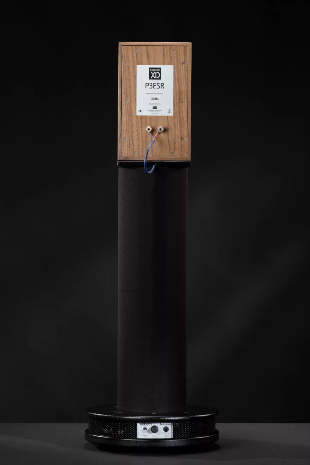 Harbeth Nelson Bass Extender Stand with wooden finish under Harbeth loudspeakers