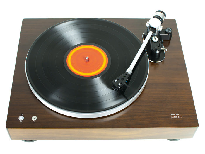 Nspired by turntables of the past, built with the best of today’s technology. The music hall classic turntable features a built-in phono preamp & phono cartridge, semi-automatic operation (auto-lift and power off), and a dark walnut wood veneer finish.A complete package A 2-speed belt driven turntable that comes complete with a tonearm, mounted music hall spirit cartridge, and built-in phono amp.